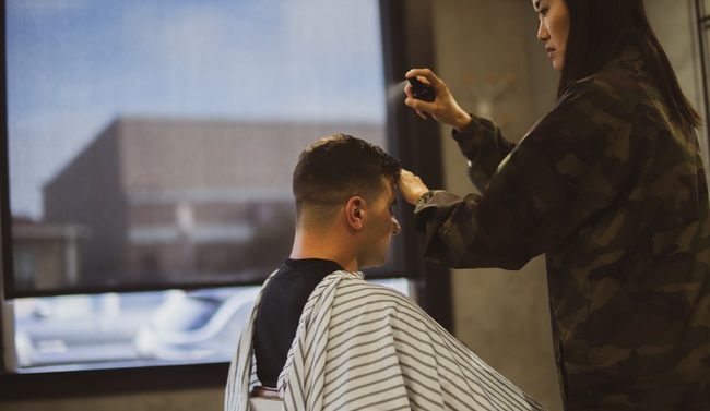A barber student in uniform.